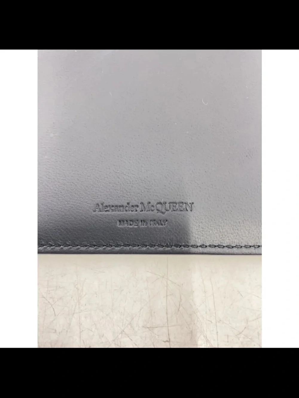 Alexander McQueen compact leather